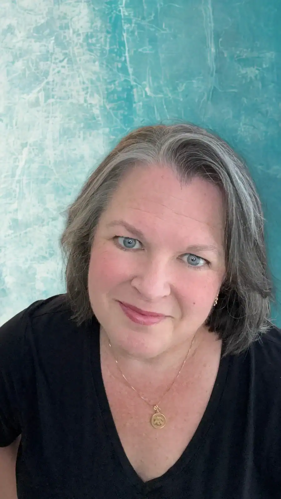 Ms. Kim Baust